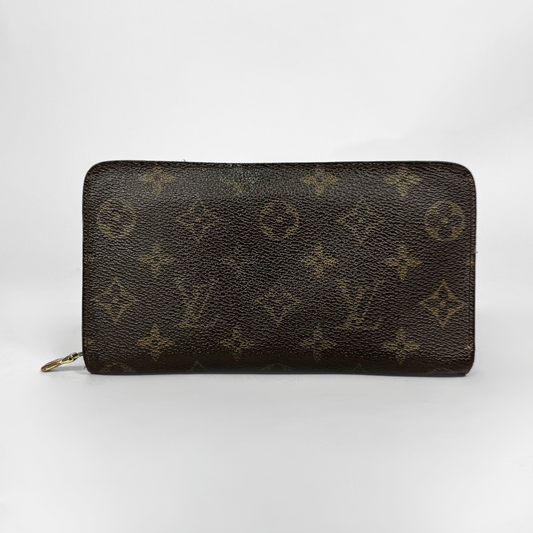 Designer wallet with monogram pattern on a white background