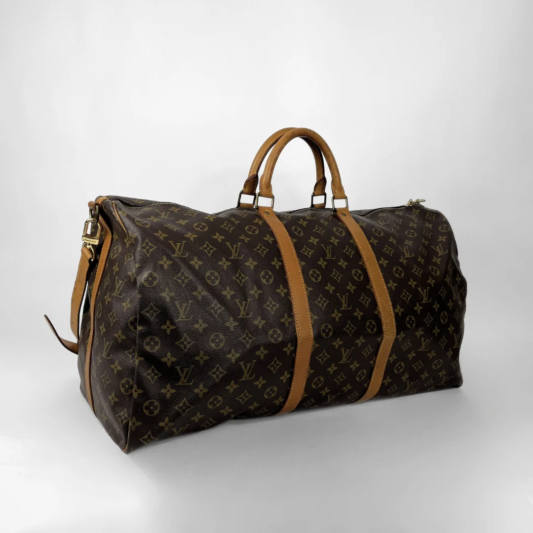 Louis Vuitton Keepall 60 Strap on a white background