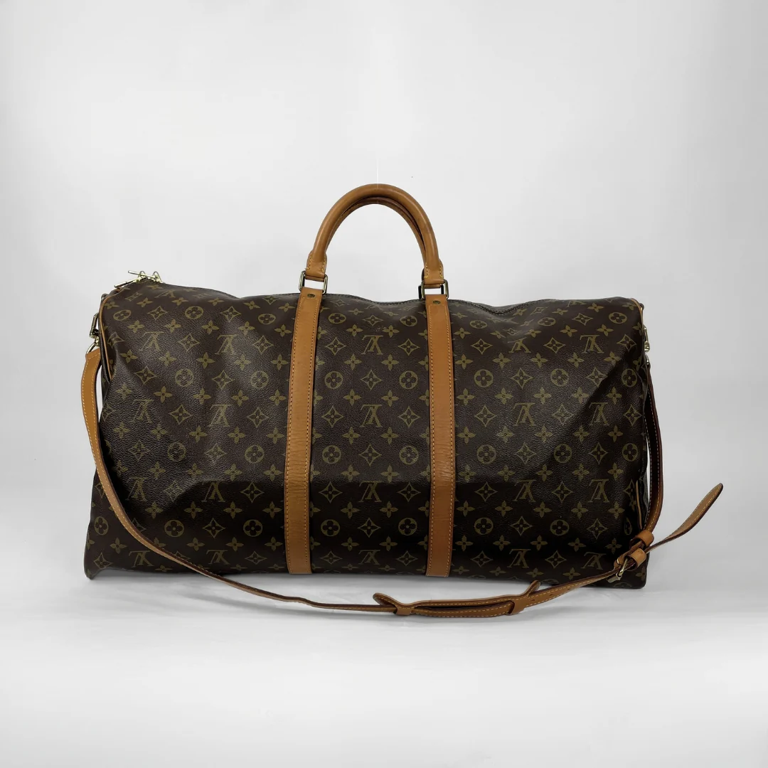 Louis Vuitton Keepall 60 Strap on a white background