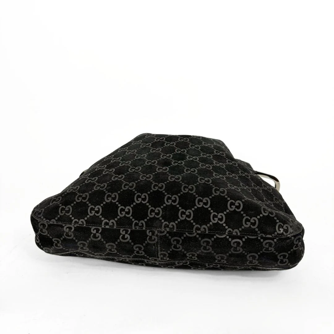 Black GG patterned pouch on a white background