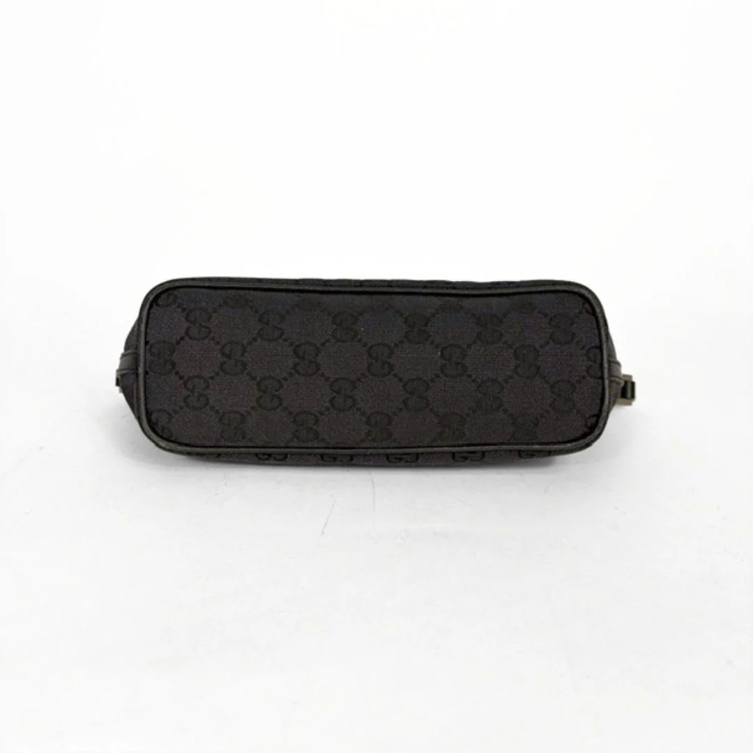 Black patterned pouch on a white background