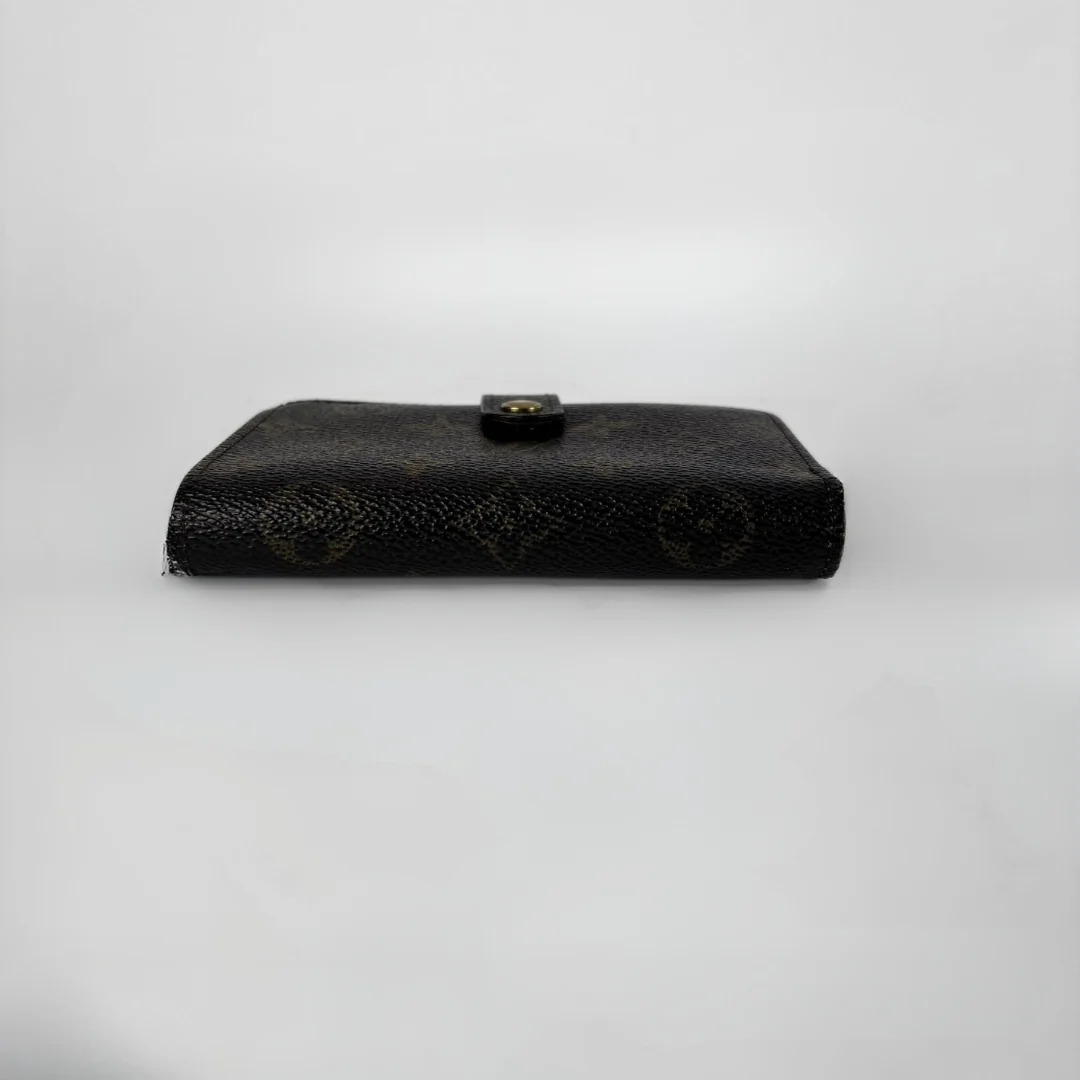 Louis Vuitton Monogram Clip Wallet on a white background