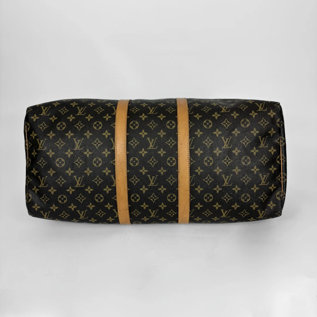 Louis Vuitton monogram duffel bag on a white background