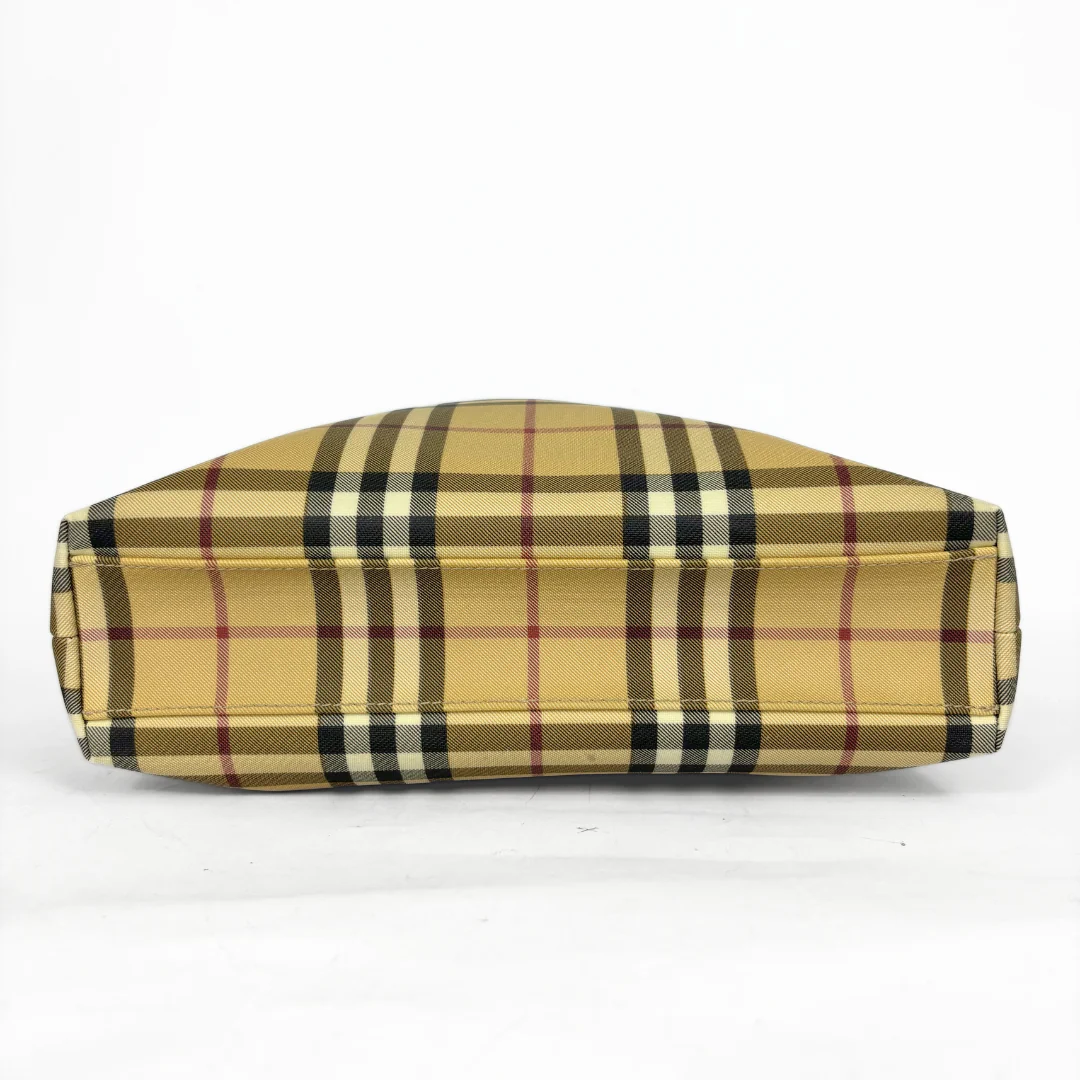 Beige checkered tote bag with black handle on a white background