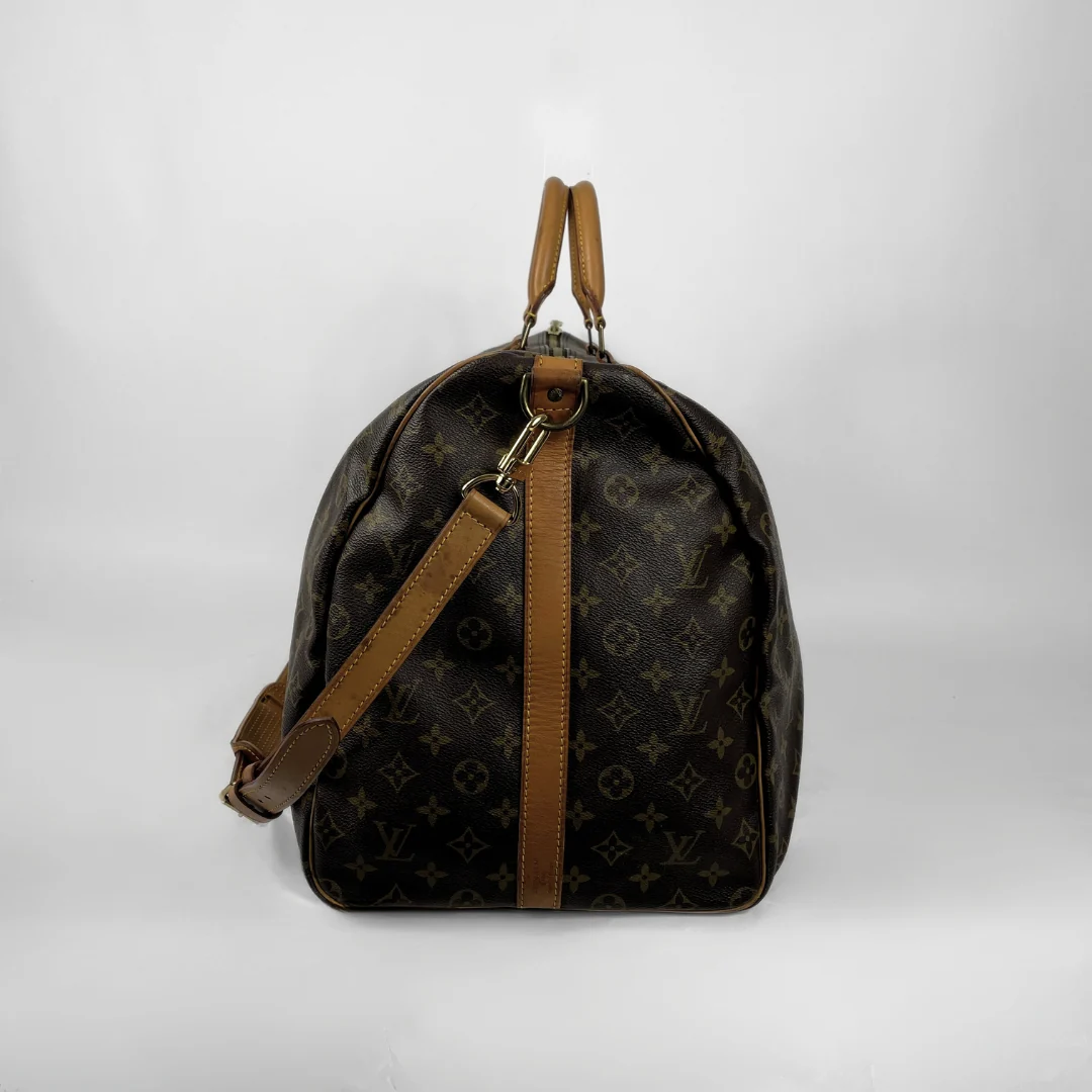 Louis Vuitton Keepall 60 Strap on a white background