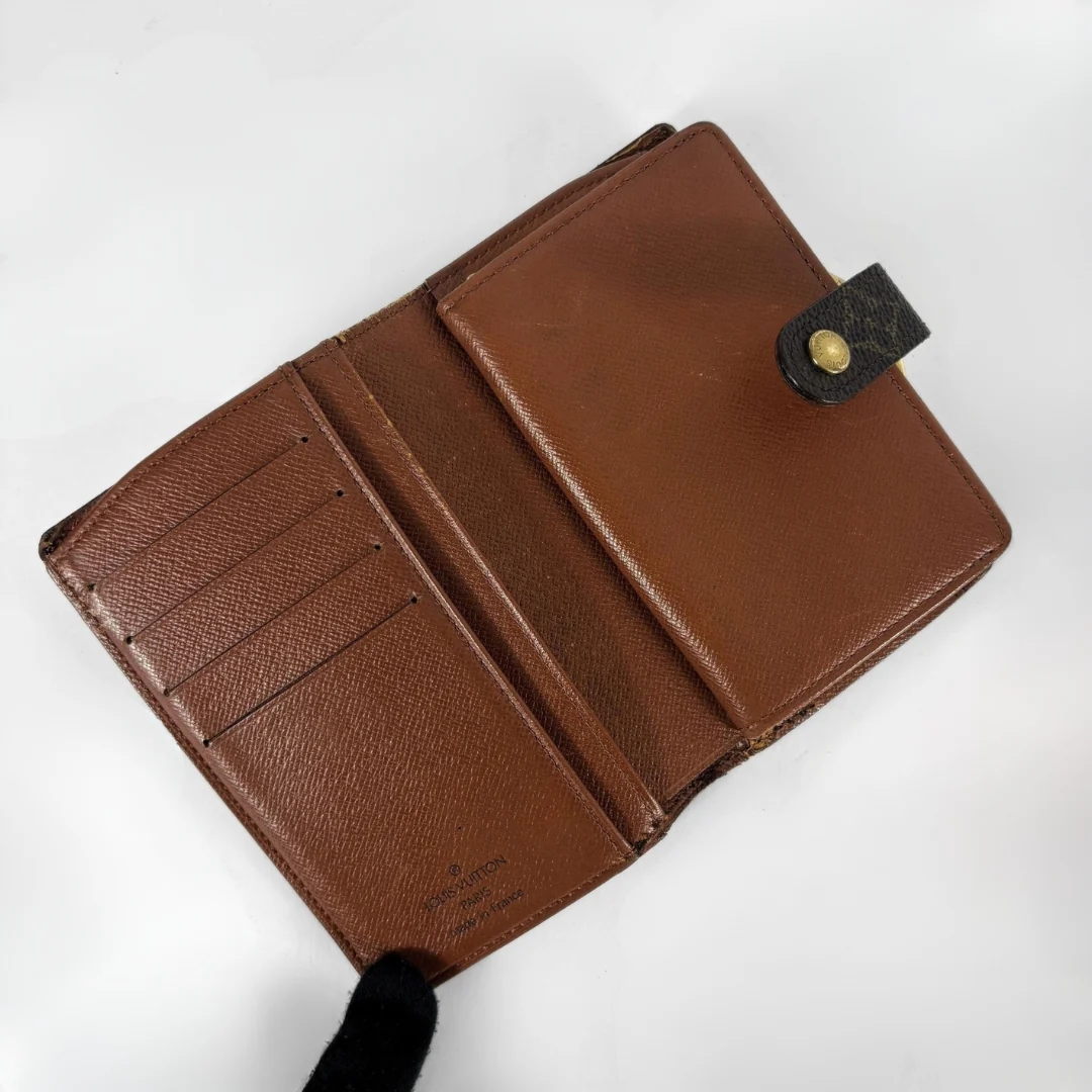 Louis Vuitton Monogram Clip Wallet on a white background