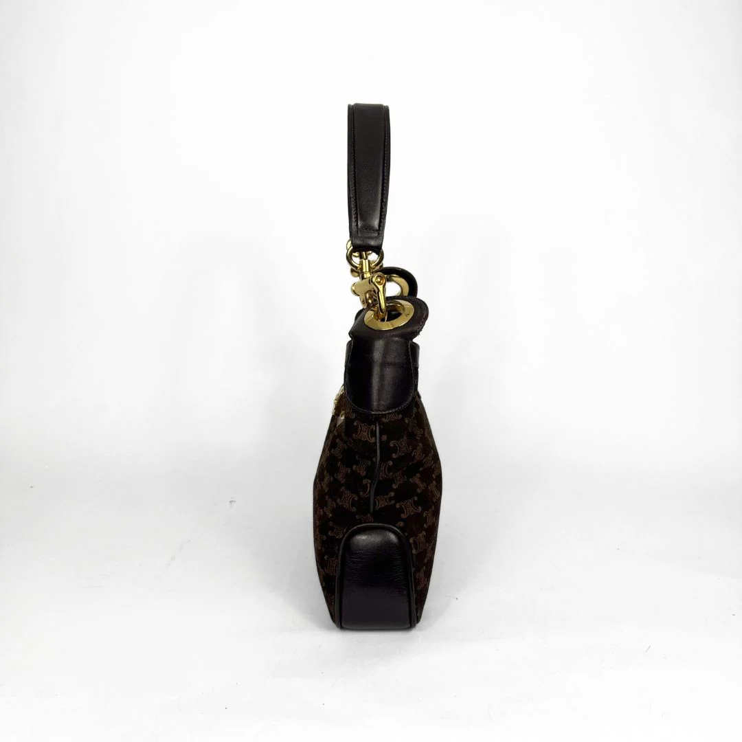 Black and gold keychain on a white background