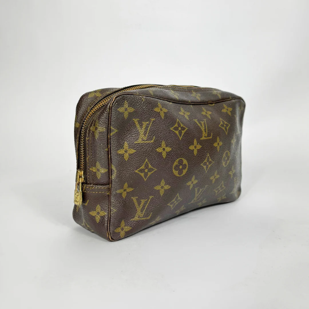 Brown Louis Vuitton monogram bag on a white background