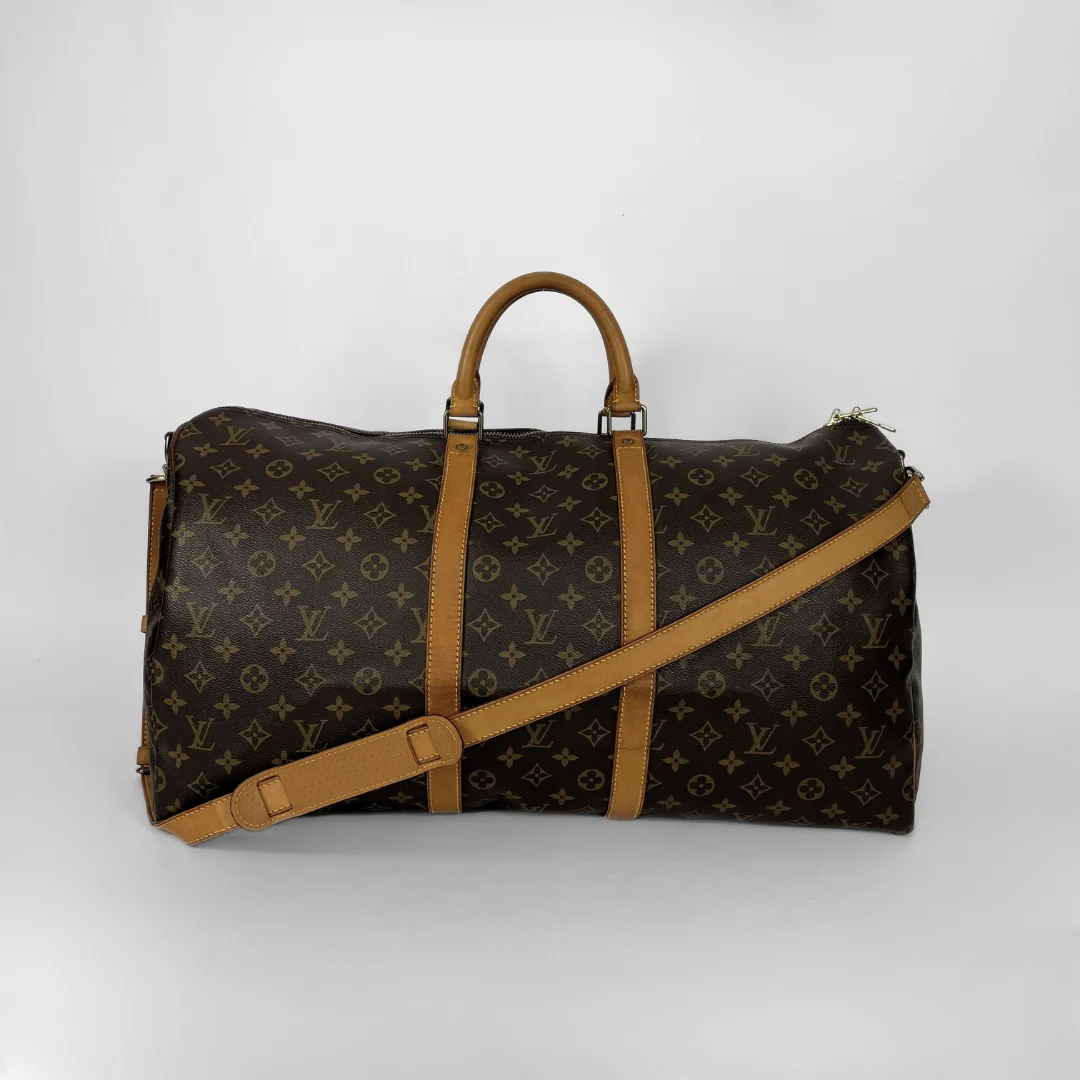 Louis Vuitton Keepall Strap 55 on a white background