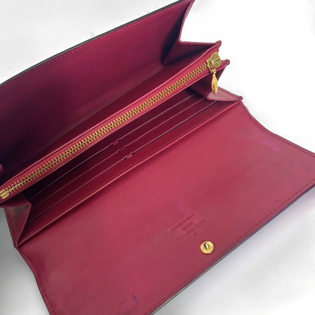Louis Vuitton Vernis Wallet on a white background